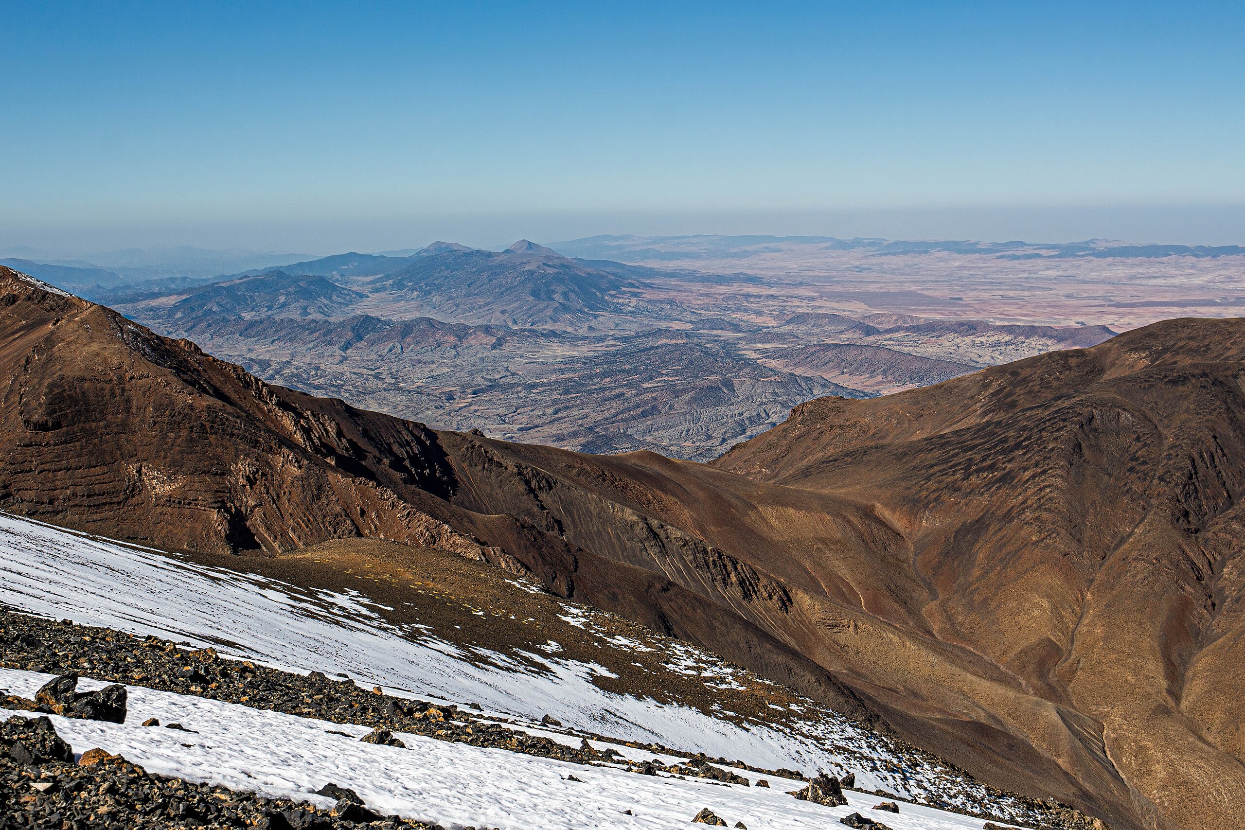Djebel Ayachi rising above the eastern High Atlas under cold light.