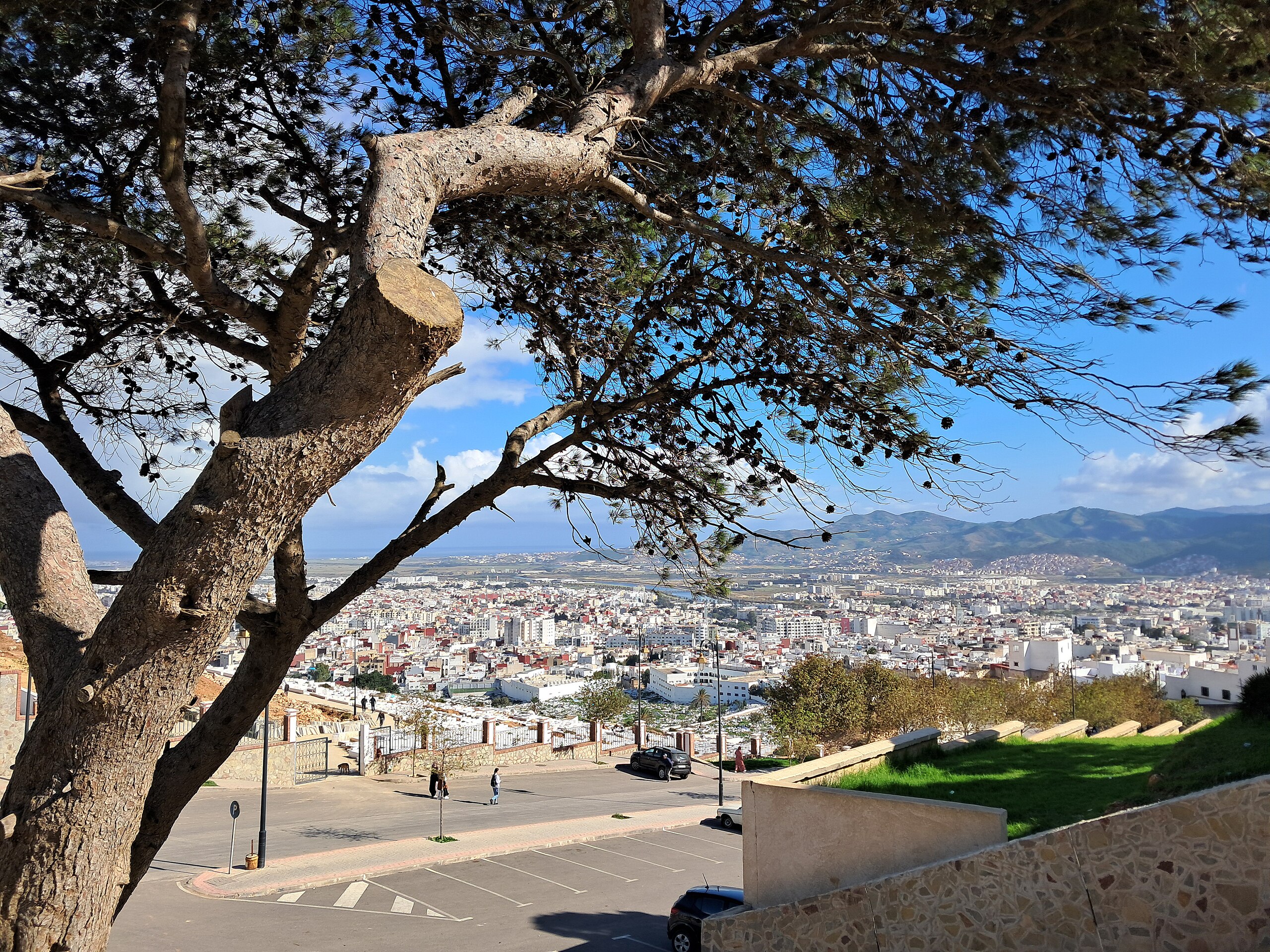Tetouan from near the Qasbah, looking out over the white medina toward the surrounding mountains.