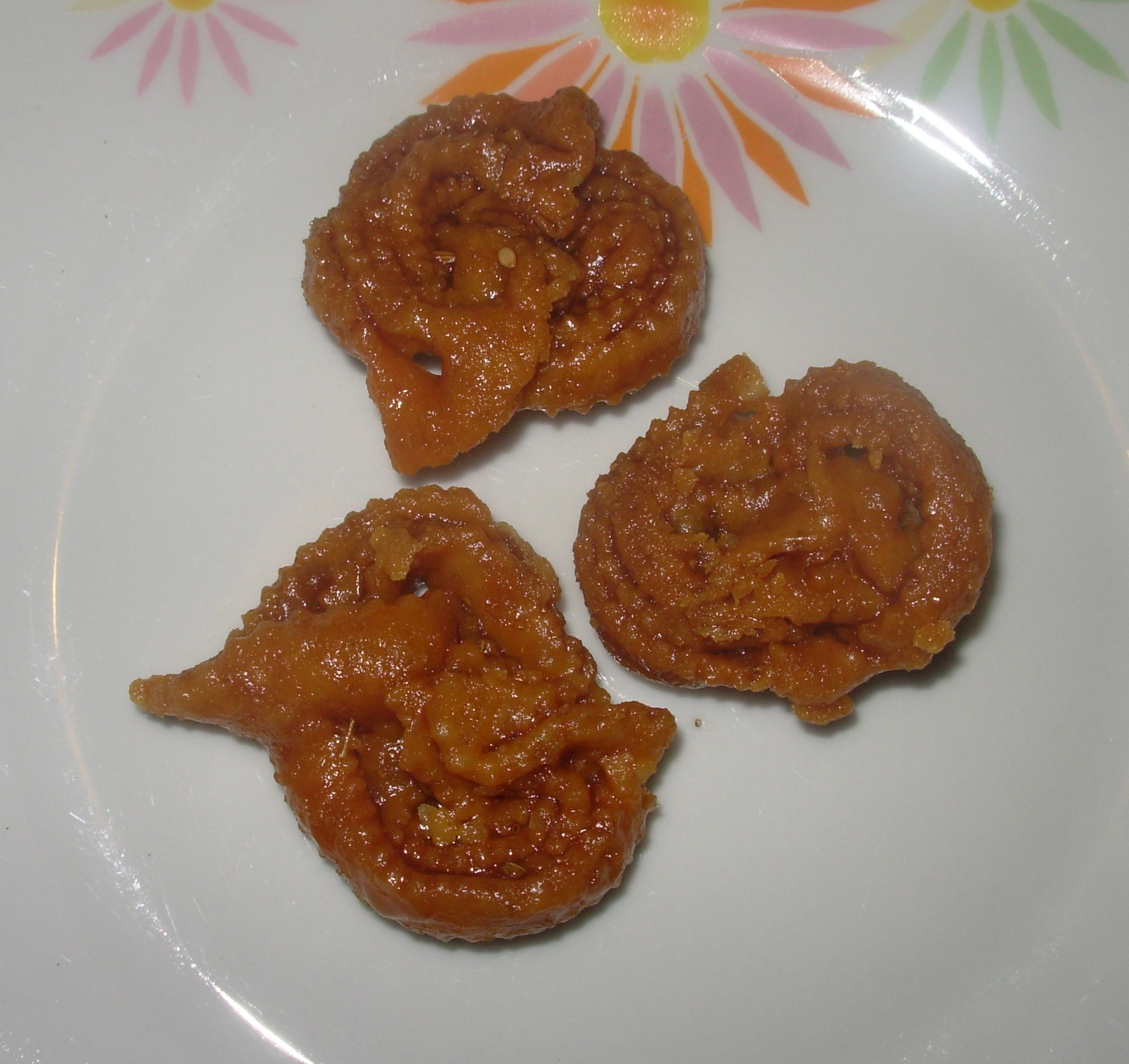 A plate of chebakia, the rose-shaped sesame-and-honey Moroccan pastry eaten during Ramadan.