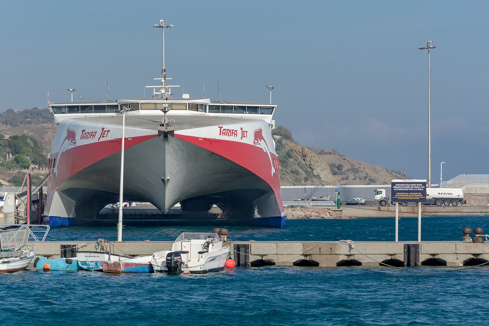 A car ferry crossing the Strait of Gibraltar between Tarifa in Spain and Tangier in Morocco, with the Moroccan coast in the background.